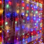 Ollny 200 LEDs 2m*2m USB Kupferdraht Vorhang Lichterkette mit Haken (bunt, IP44 wasserdicht)